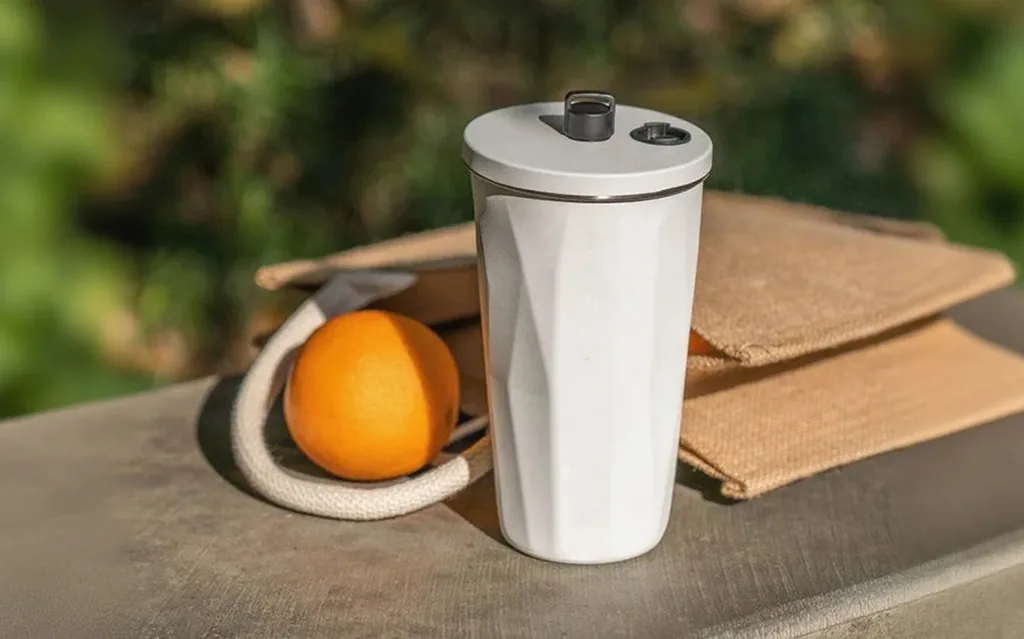 Stainless steel coffee tumbler closeup