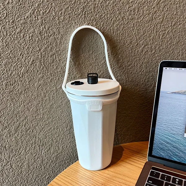 Skinny coffee tumbler for easy grip