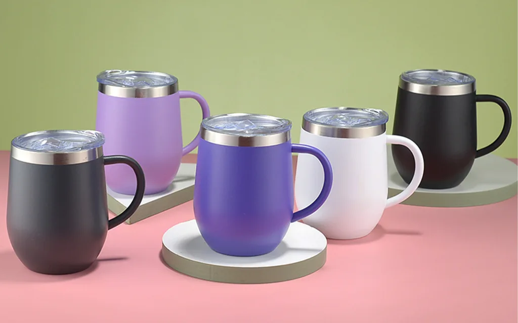travel coffee tumbler in hand